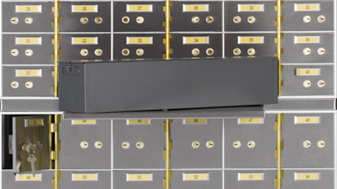 Image of safe deposit boxes. Physical security products such as safes, vaults, and safe-deposit boxes play a pivotal role in ensuring the protection and confidentiality of valuable assets within financial institutions.